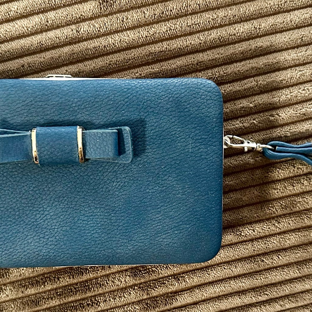 Blue Textured Clutch with Bow Accent